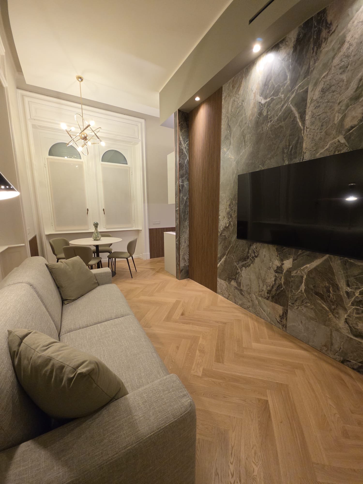 Living con marmo Verde Alpi a Milano